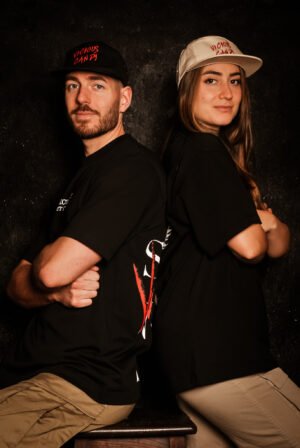 Man and girl wearing Vicious Candy Clothes.