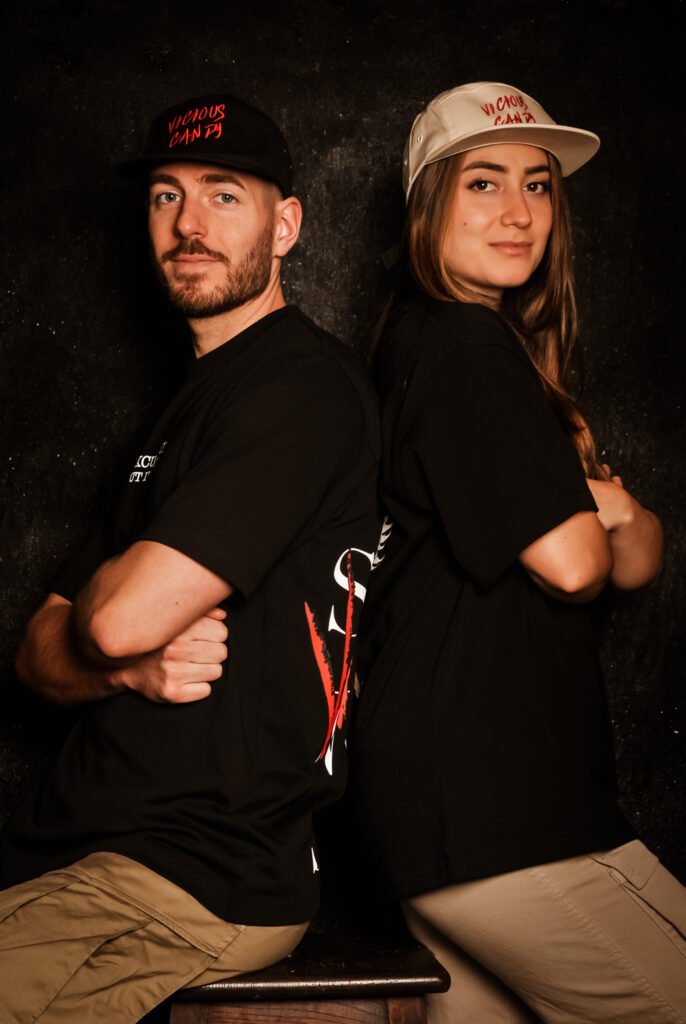 Man and girl wearing oversized black tee