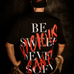 Man wearing Black Oversized Tee