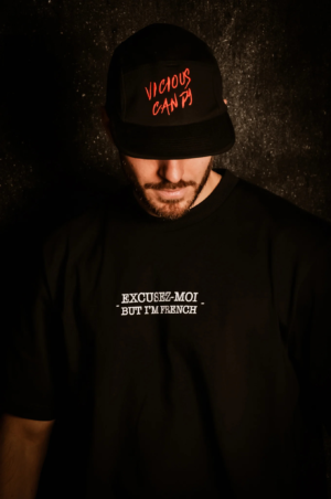 Man wearing Vicious Candy black Cap